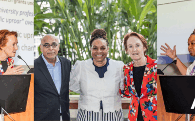 Mary Woolley, Dr. Kasisomayajula Viswanath, and Dr. Cherié Butts at IMMUNOLOGY2025