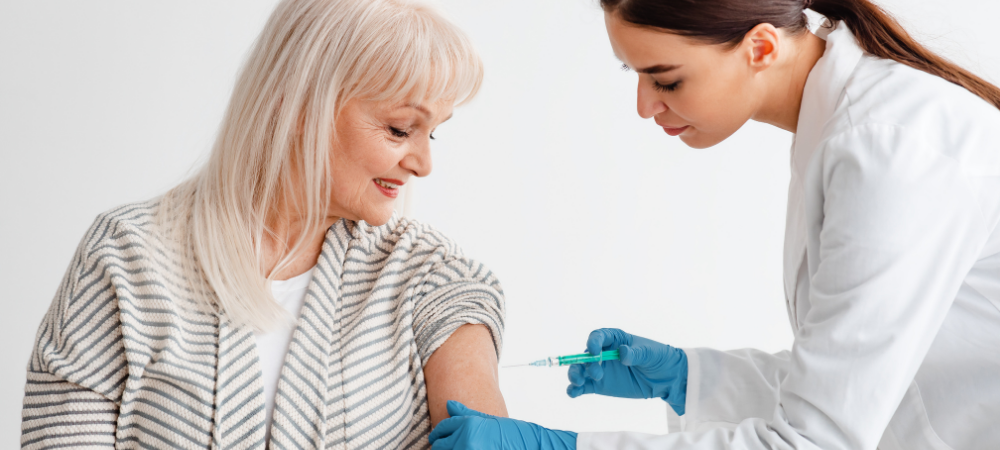 Woman receiving a vaccine